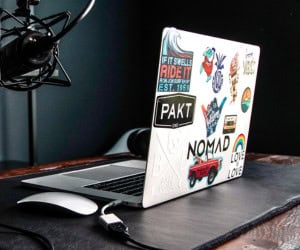 Branded stickers and decals on a laptop