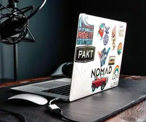 Branded stickers and decals on a laptop