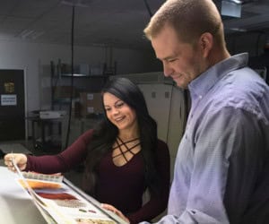 A client having a conversation with their printer about a product their working on