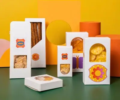 Food packaging custom inserts or windows that showcase premium products while maintaining rigidity and protection.