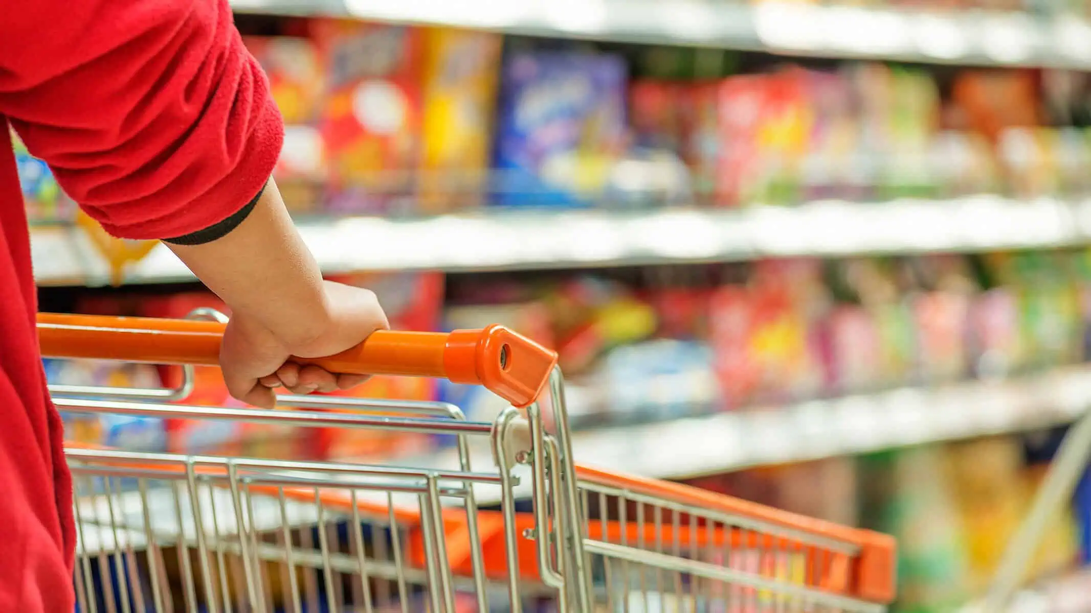 buyer grocery shopping, where the folding carton packaging can influence their decision to purchase