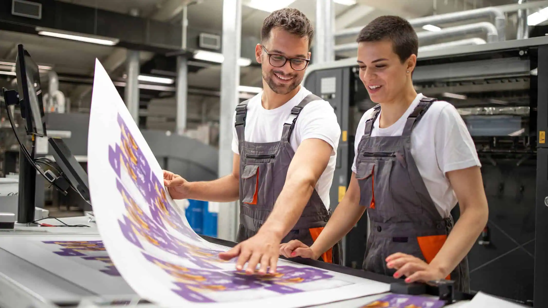 a print shop showing a new client a large format print sample