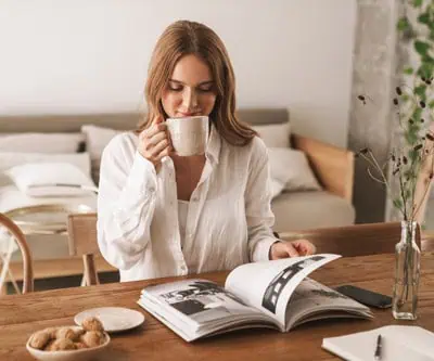 Woman reading high impact short run book